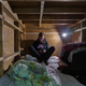 Image for article titled Photos: Tokyo travelers get comfortable in the tiniest of spaces